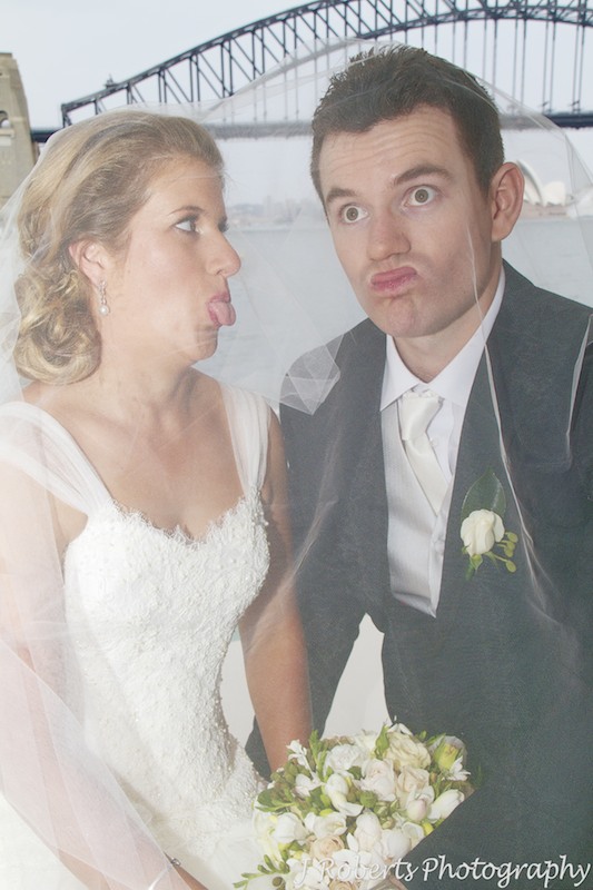 Bridal couple making funny faces - wedding photography sydney